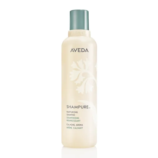 Aveda short-form post: a tall bottle of Aveda shampoo with a teal cap on a white background.