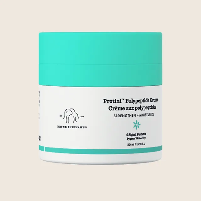 Drunk Elephant short-form post: a jar of Protini Polypeptide Cream with a teal lid on a cream background.