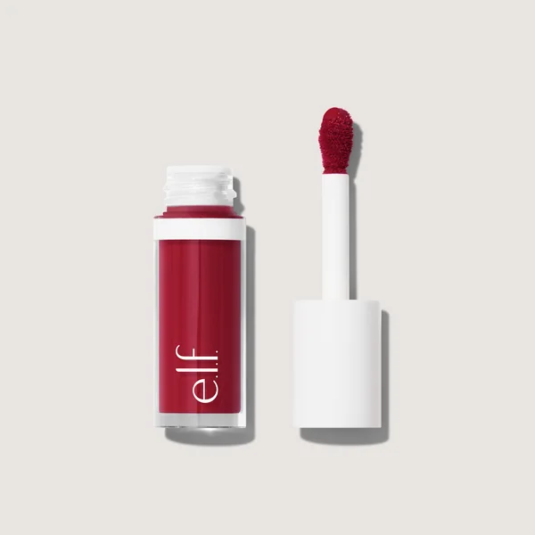 e.l.f. Cosmetics short-form post: a Camo Liquid Blush bottle in a deep berry shade beside its white applicator on a soft grey background.