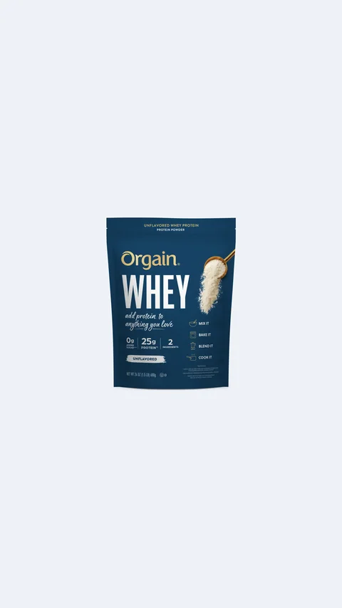 Orgain short-form post: a navy Whey bag with a scoop of powder printed on the front, on a pale blue-grey background.