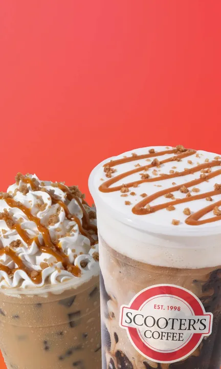 Scooter's Coffee short-form post: two iced coffee drinks topped with whipped cream and caramel drizzle on an orange-pink gradient.