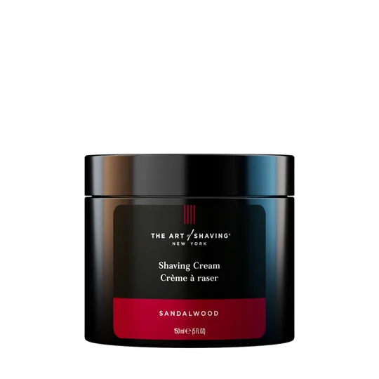 The Art of Shaving short-form post: a black jar of Art of Shaving shave cream with a red stripe on a dark grey background.
