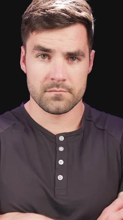 Thomas Frank short-form post: a man with short brown hair and folded arms in a dark henley shirt, cut out against a black background.
